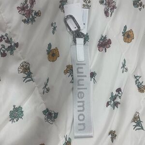Lululemon Silver and White Keychain